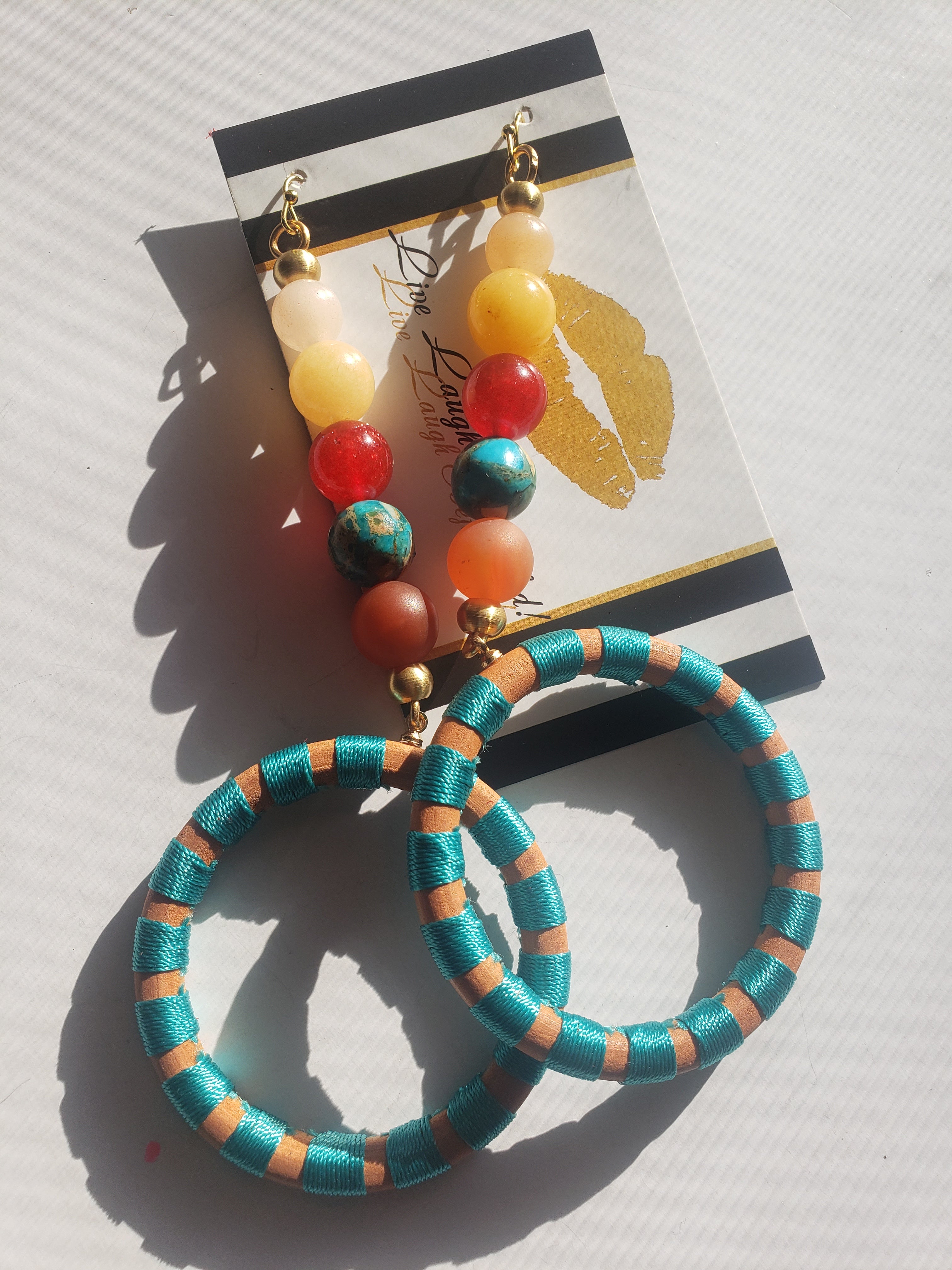 Brightly colored wood + natural stone hoops