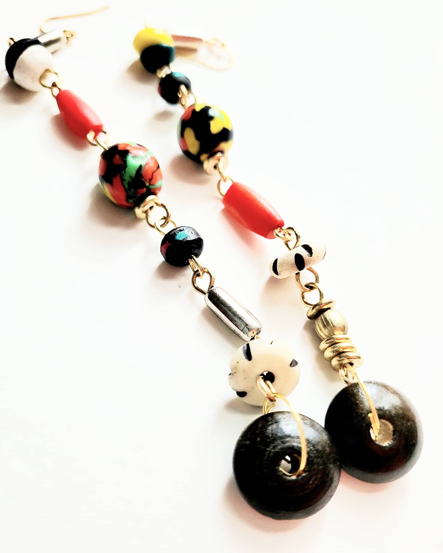 'Shero', a 5.5 inch mixed media compilation of wood, bone, Ghanaian recycled glass beads and brass!